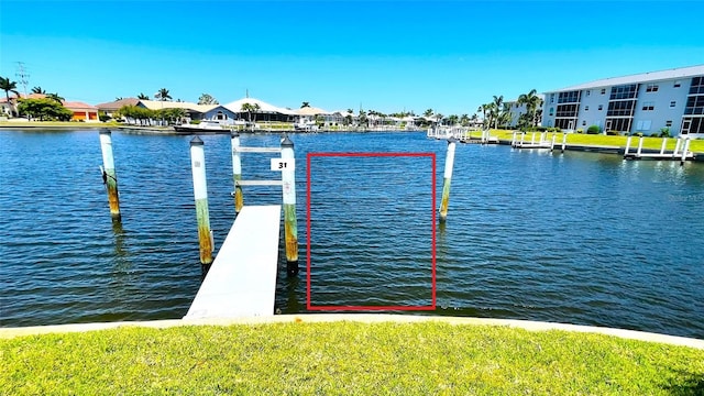 dock area featuring a water view