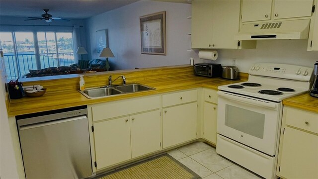 kitchen featuring ceiling fan, sink, range hood, white range with electric stovetop, and dishwashing machine