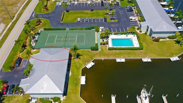 birds eye view of property featuring a water view