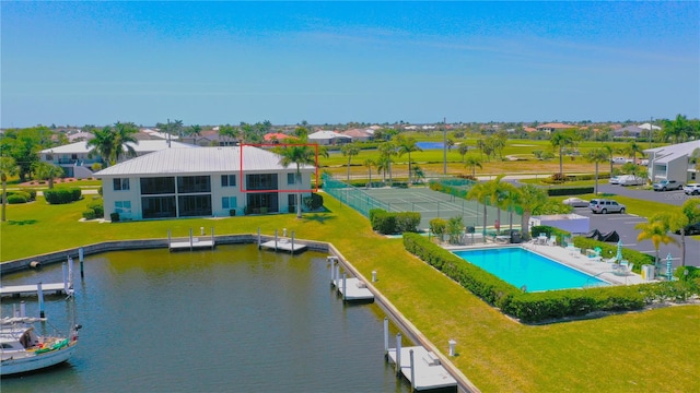 aerial view with a water view and a residential view