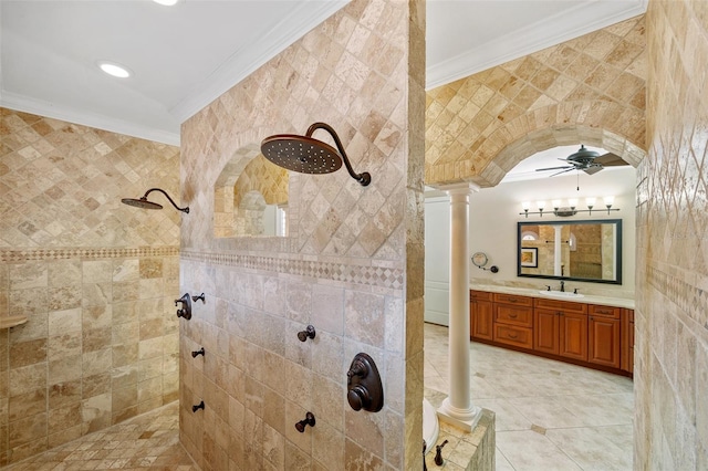 bathroom with ceiling fan, vanity, tile floors, and tiled shower