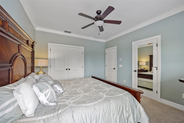 bedroom featuring a closet, ceiling fan, carpet, and crown molding