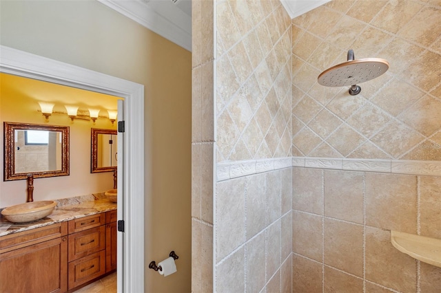 bathroom featuring tile walls, crown molding, tile flooring, and vanity