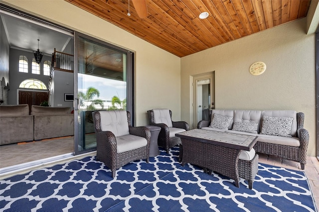 view of patio with ceiling fan and an outdoor hangout area