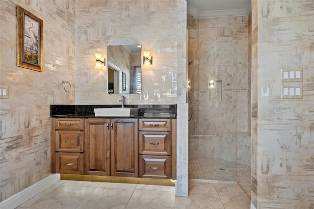 bathroom featuring tiled shower, vanity, tile floors, and crown molding