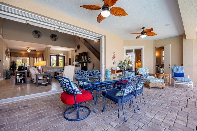 view of terrace featuring ceiling fan