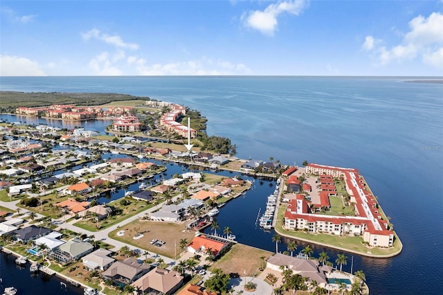 bird's eye view with a water view