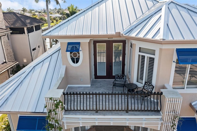 property entrance featuring french doors