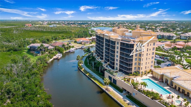 drone / aerial view with a water view