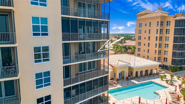 view of swimming pool with a patio area