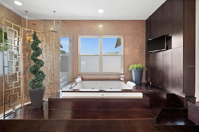 bathroom featuring a tub