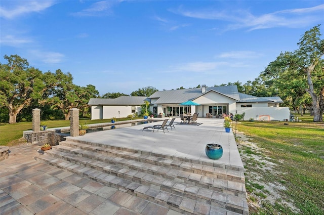 view of front of property featuring a patio area