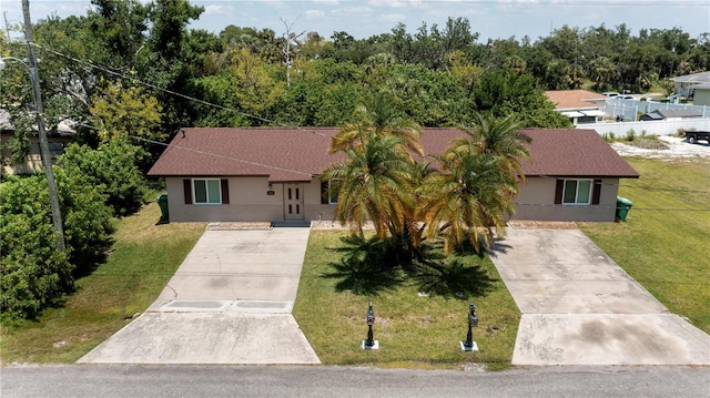 view of front of home featuring a front lawn