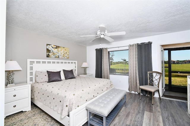 bedroom featuring a textured ceiling, hardwood / wood-style floors, ceiling fan, and access to exterior