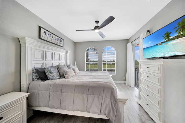 bedroom featuring ceiling fan and hardwood / wood-style floors