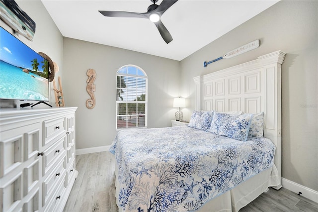 bedroom featuring light hardwood / wood-style flooring and ceiling fan