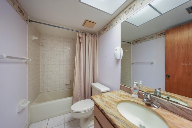 full bathroom featuring oversized vanity, shower / tub combo, tile floors, and toilet