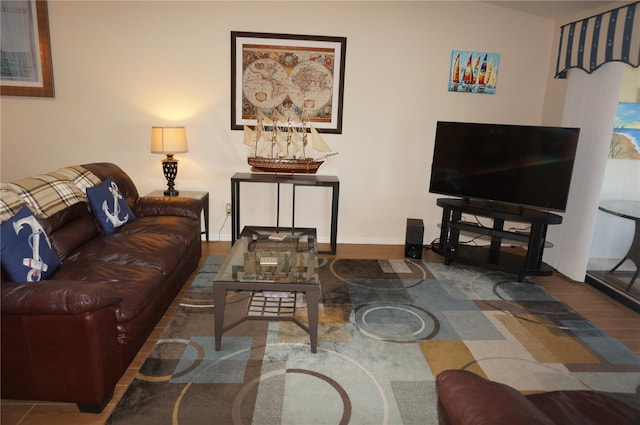 living room with dark hardwood / wood-style flooring