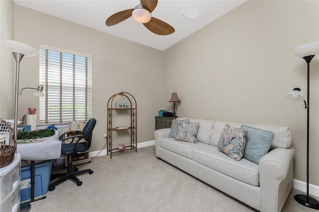 office with vaulted ceiling, ceiling fan, and light colored carpet