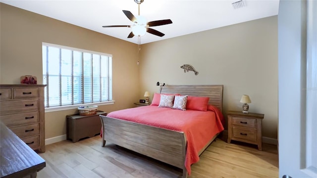 bedroom featuring ceiling fan and light hardwood / wood-style floors