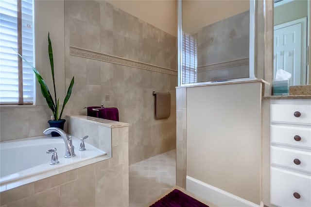 bathroom with independent shower and bath