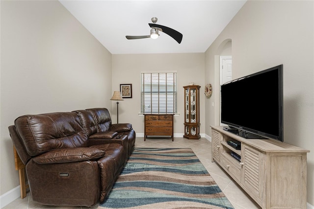 living room with ceiling fan and light tile patterned floors