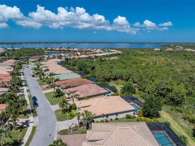 drone / aerial view with a water view