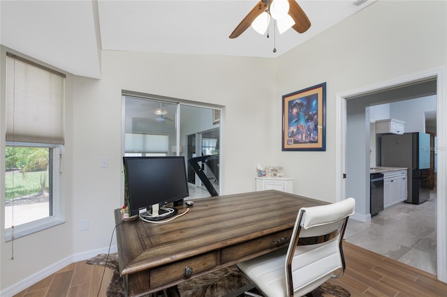 office area with hardwood / wood-style flooring, ceiling fan, and lofted ceiling