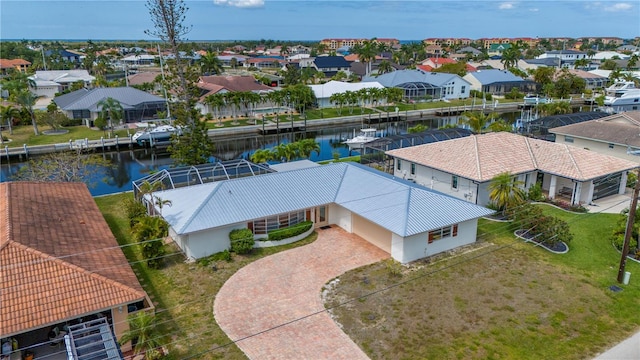 bird's eye view with a water view