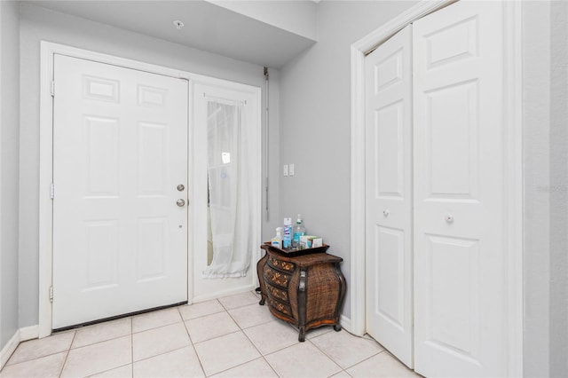 entrance foyer featuring light tile flooring