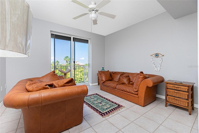 living room featuring ceiling fan and light tile flooring