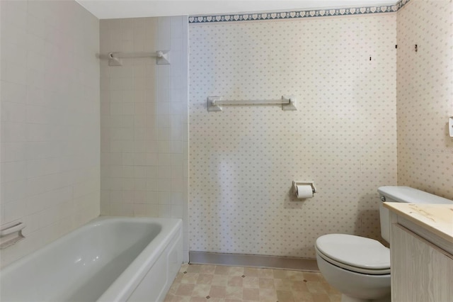 full bathroom featuring vanity, toilet, and bathtub / shower combination