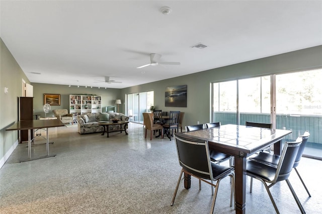 21280 Brinson Ave Unit 214, Port Charlotte, FL 33952 - dining area featuring visible vents, ceiling fan, and a wealth of natural light