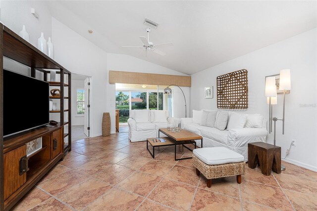 living room featuring ceiling fan and vaulted ceiling