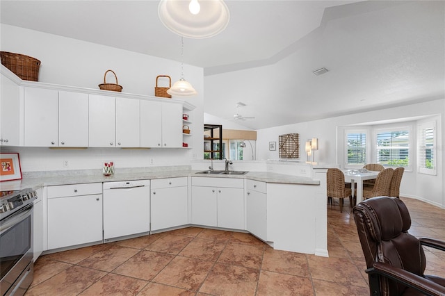 kitchen with white cabinetry, sink, kitchen peninsula, white dishwasher, and decorative light fixtures