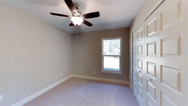 interior space featuring ceiling fan