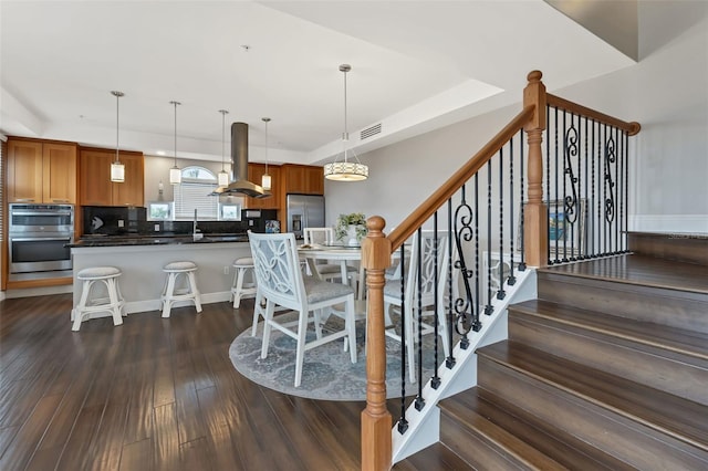 interior space with dark hardwood / wood-style floors