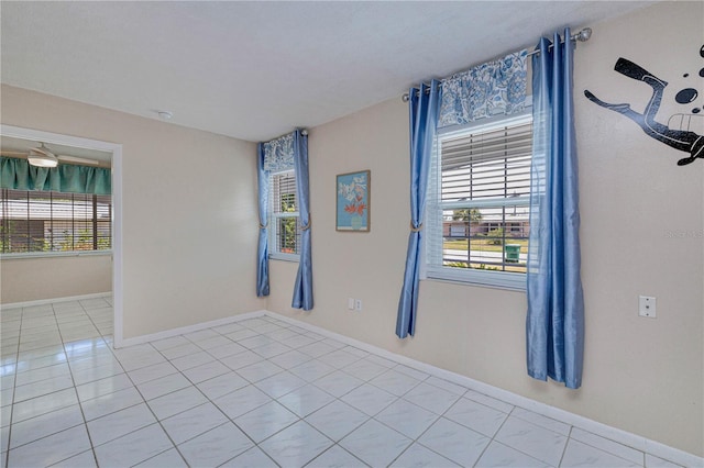 view of tiled spare room