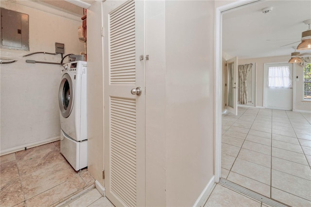 laundry room with washer / clothes dryer and light tile flooring