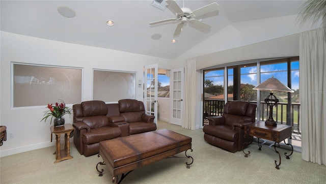 carpeted living room with lofted ceiling and ceiling fan