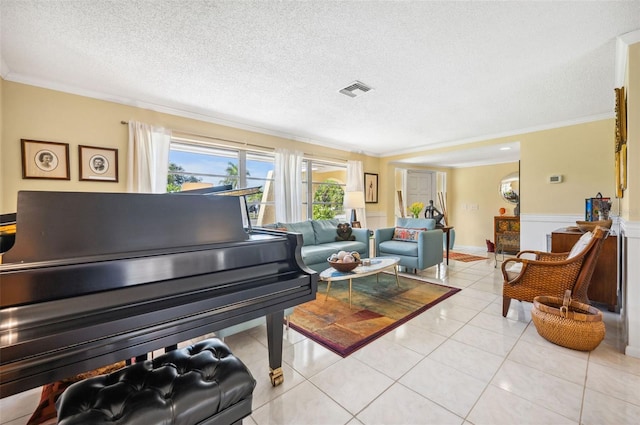 living room featuring ornamental molding, a textured ceiling, and light tile flooring