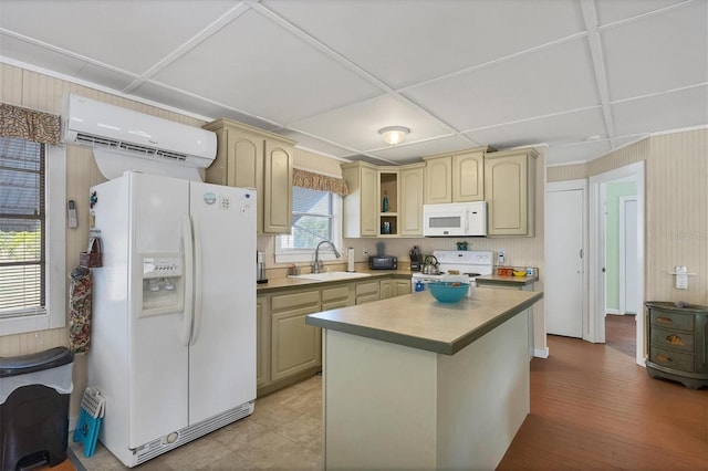 kitchen featuring a center island, sink, white appliances, a wall mounted AC, and wood-type flooring