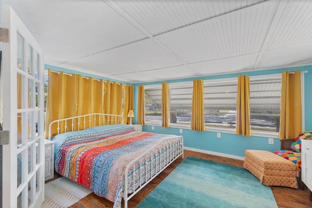 bedroom featuring hardwood / wood-style flooring