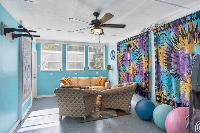 sunroom / solarium with ceiling fan