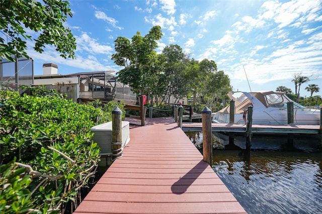 view of dock with a water view