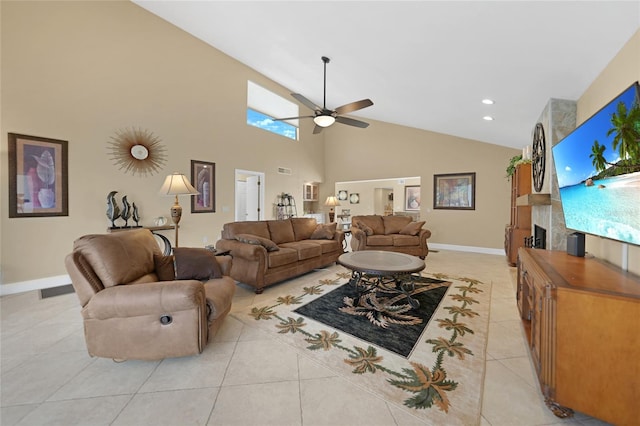 living room with high vaulted ceiling, ceiling fan, and light tile floors