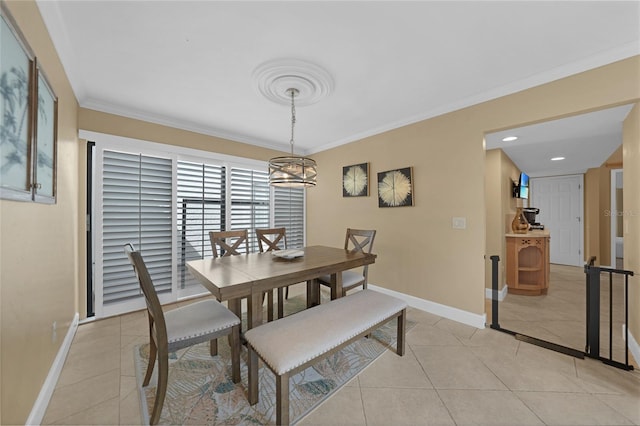 tiled dining area with crown molding