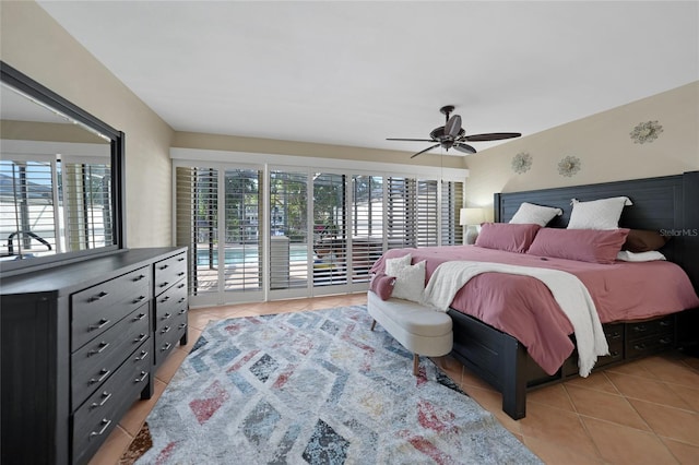 bedroom featuring ceiling fan, light tile flooring, and access to outside