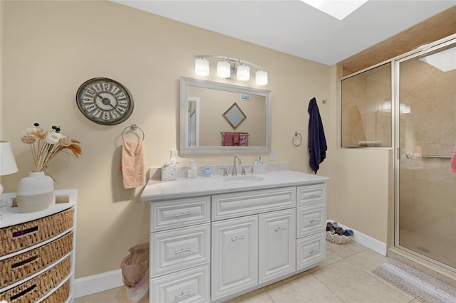 bathroom featuring a shower with shower door, vanity, and tile floors