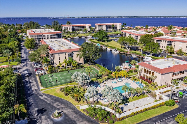 birds eye view of property featuring a water view